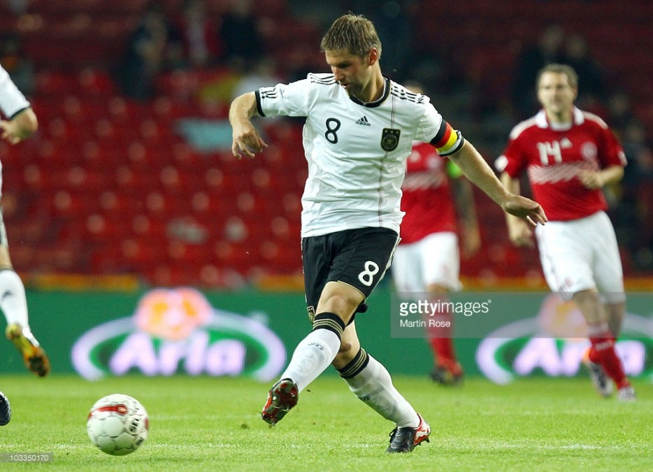 COPENHAGEN, DENMARK - AUGUST 11: Thomas Hitzlsperger of Germany runs with the ball during the International Friendly match between Denmark and Germany at Parken stadium on August 11, 2010 in Copenhagen, Denmark. (Photo by Martin Rose/Bongarts/Getty Images)